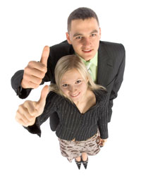 Man and woman with thumbs up